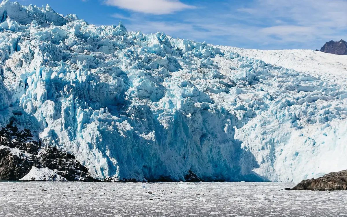 The blue face of a tidewater glacier in Kenai Fjords National Park