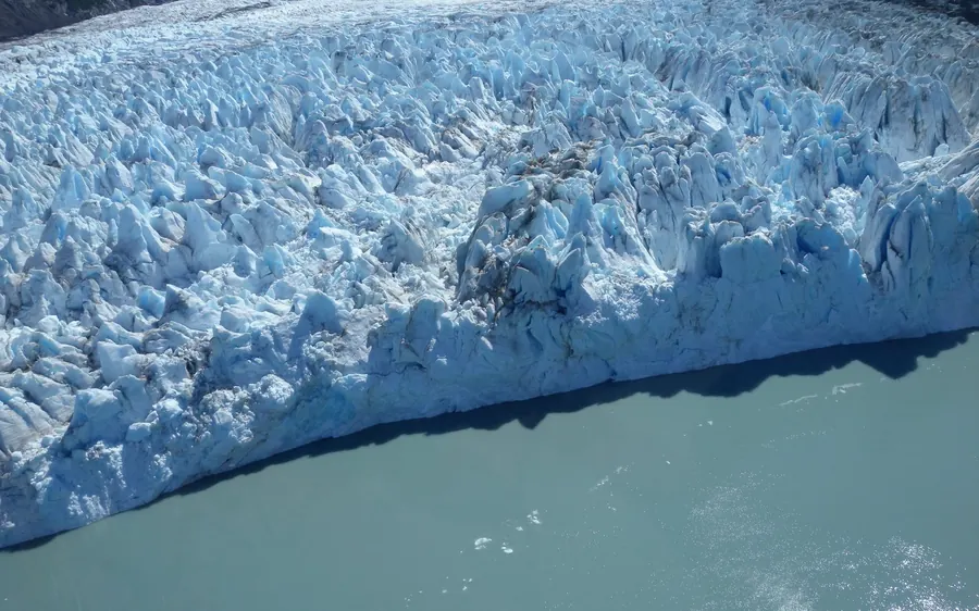 Blue ice inside a glacier crevasse in Alaska